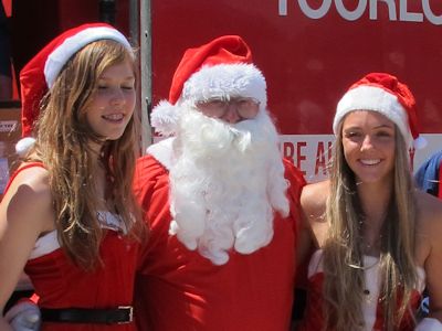 Santa with some more Santas at lake Tyers Beach