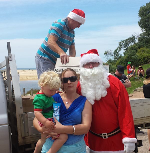 Helpers of Santa at Lake Tyers Beach 2013