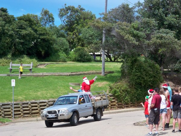 Santa arriving at Lake Tyers Beach