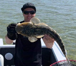 Sprinkles (aka Shane Greaves) with a grand Flathead at Lake Tyers